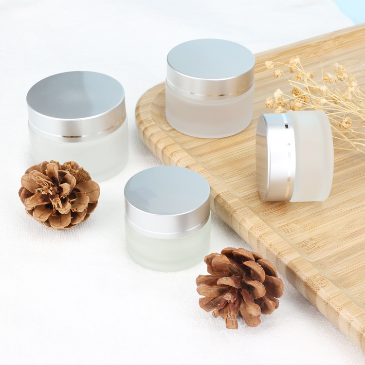 Wholesale 10 15 20 30 50 gram clear skincare cosmetic jars thick face cream glass jar with round caps