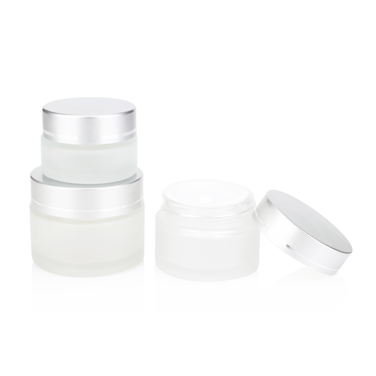 Wholesale 10 15 20 30 50 gram clear skincare cosmetic jars thick face cream glass jar with silver round caps