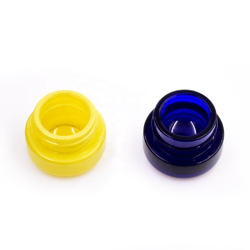 Wholesale 10 ml dark blue round straight side eye cream cosmetic packing glass jar with plastic child proof lid.