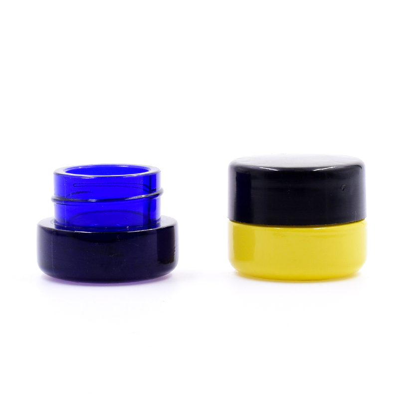 Wholesale 10 ml dark blue round straight side eye cream cosmetic packing glass jar with plastic child proof lid.