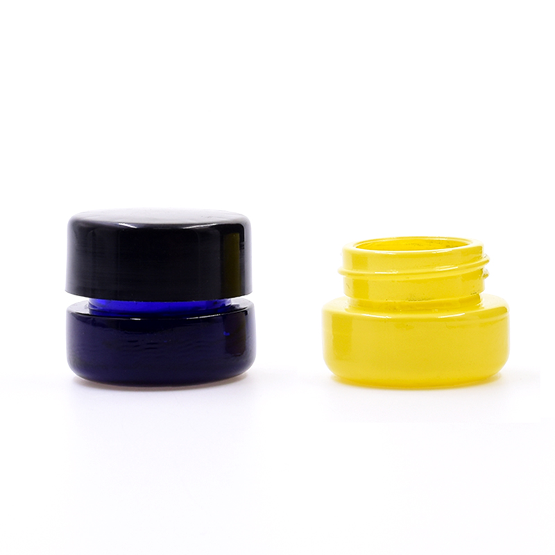 Wholesale 10 ml dark blue round straight side eye cream cosmetic packing glass jar with plastic child proof lid.