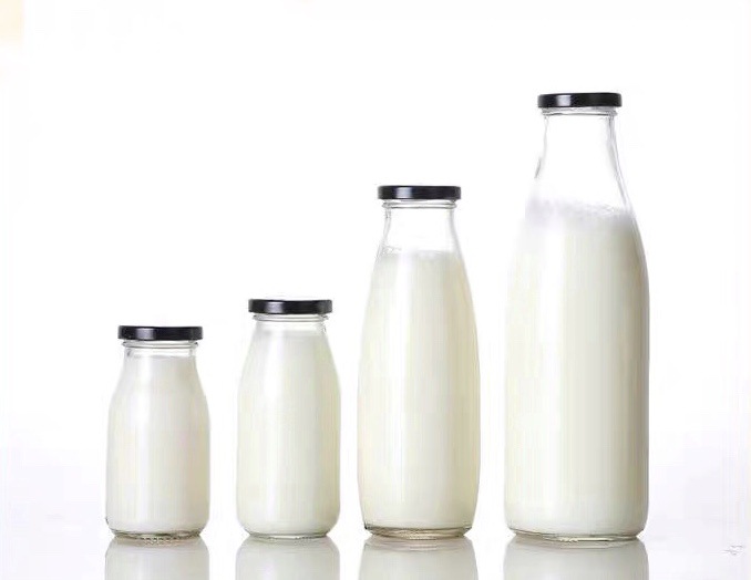 Wholesale 1000 ml 500 ml 250 ml 200 ml 100 ml milk juice beverage ice tea coffee used glass bottles with metal  tin cap