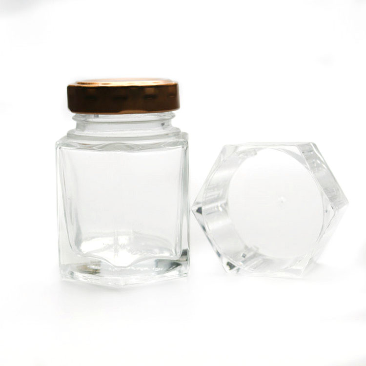 Wholesale 100g hexagon honey glass jar with metal closure lid honey jars glass hexagonal