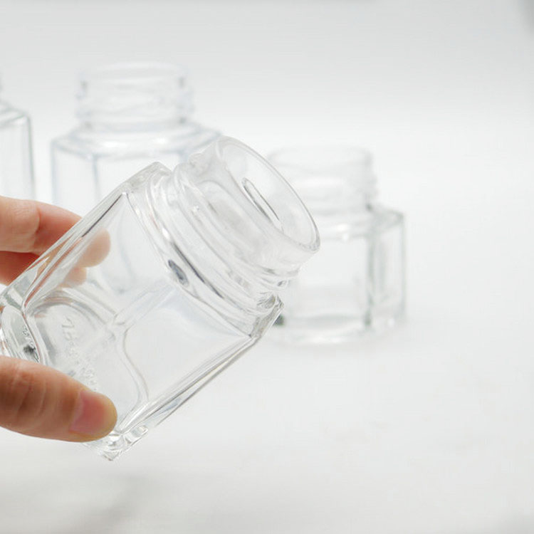 Wholesale 100g hexagon honey glass jar with metal closure lid honey jars glass hexagonal
