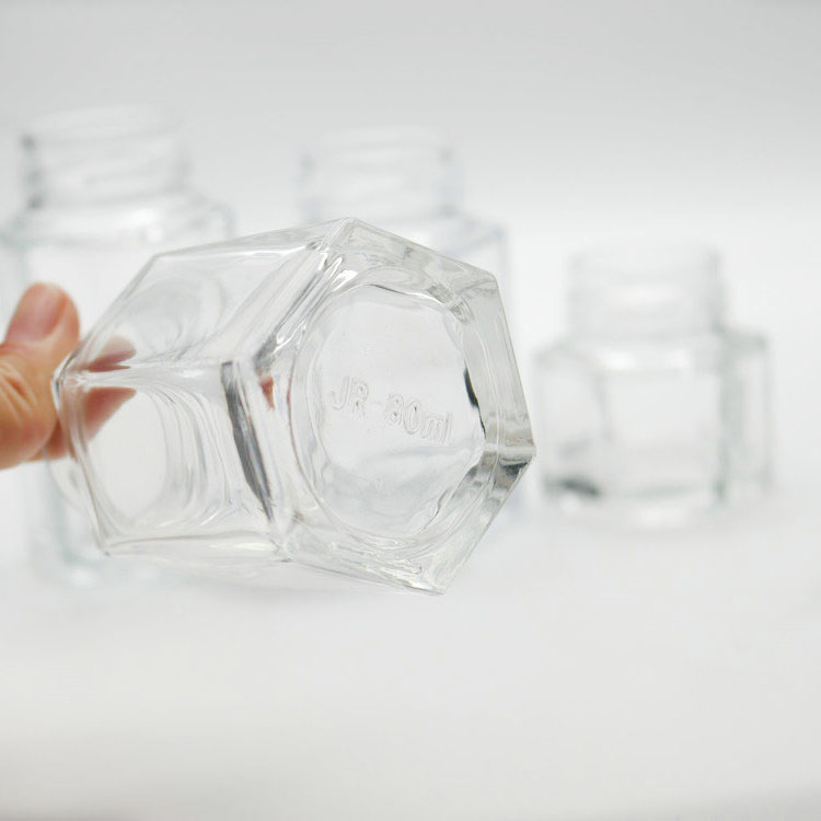 Wholesale 100g hexagon honey glass jar with metal closure lid honey jars glass hexagonal
