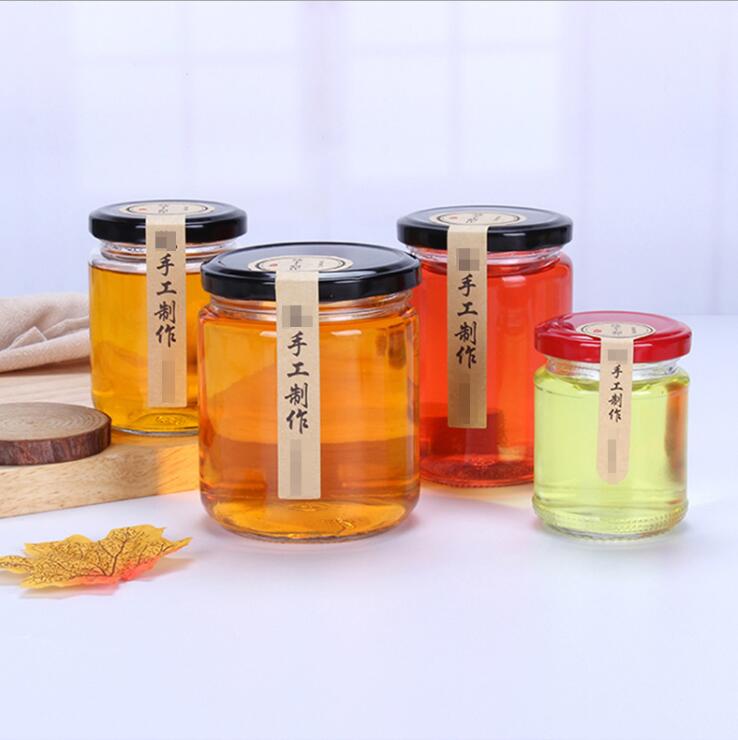 Wholesale 100ml 150ml 190ml 240ml empty round glass honey jam jars with black tinplate lids