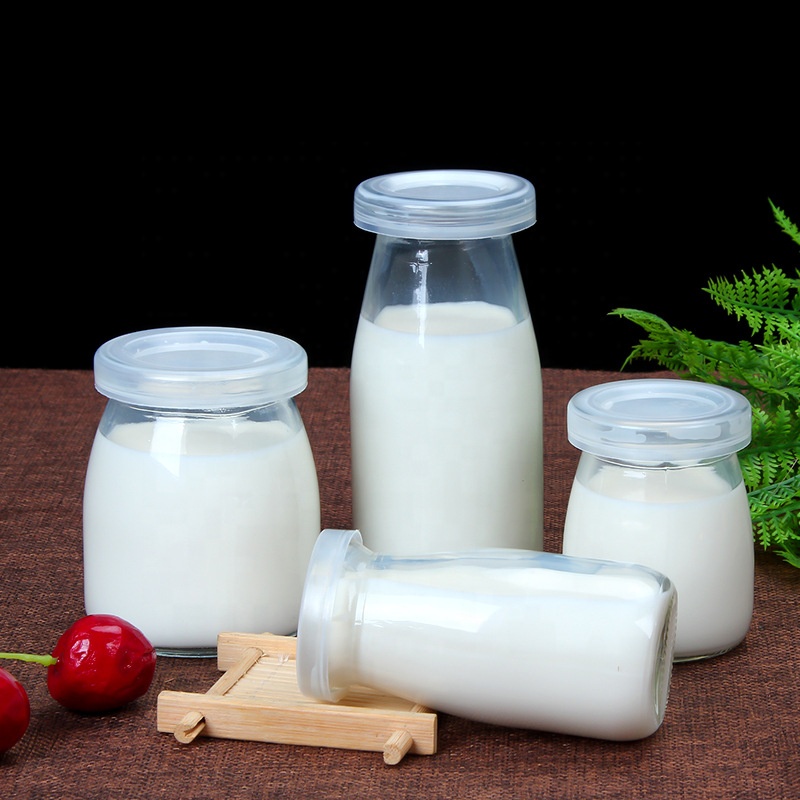 Wholesale 100ml 150ml 200ml Mini Round Clear Storage Glass Jars with Cork Lids for Wedding Gifts