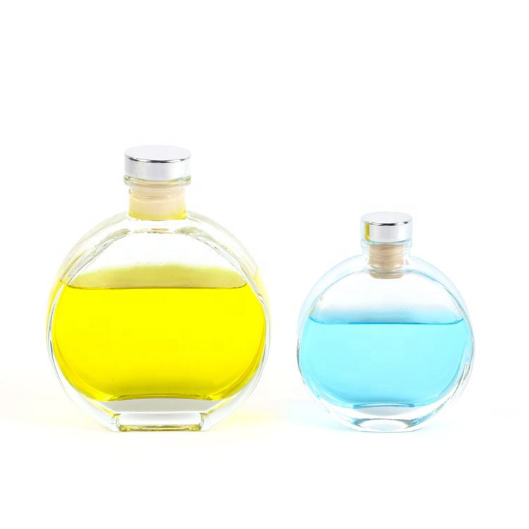 Wholesale 100ml 150ml 200ml clear flat round reed diffuser glass bottle for decoration