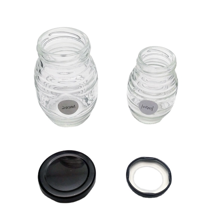 Wholesale 100ml 200ml honeycomb glass honey jar with metal lid