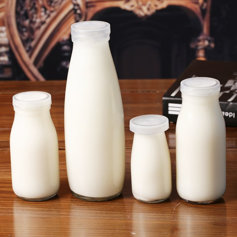 Wholesale 100ml 250ml 500ml glass milk bottles with plastic lid sealed yogurt bottle