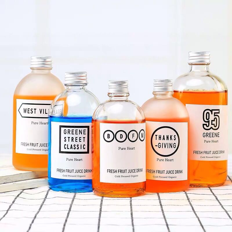 Wholesale 100ml 280 ml 350 ml 500ml Transparent or Matte New style glass Beverage Juice drink bottle