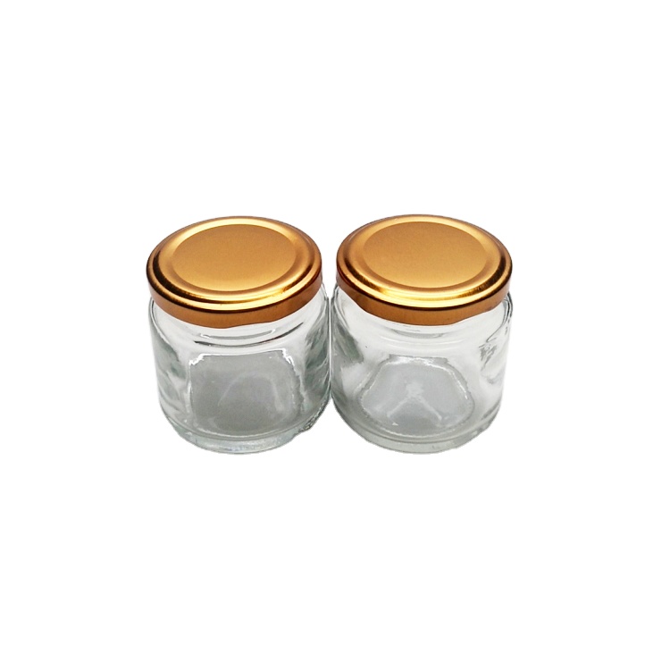 Wholesale 100ml round clear glass food jar with metal lid