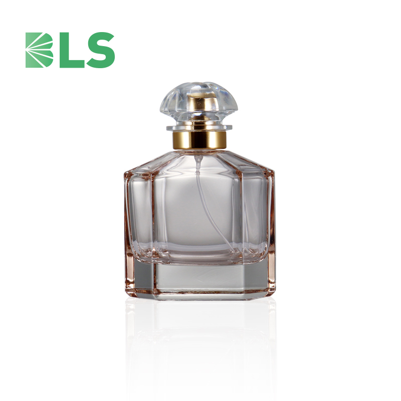 Wholesale 100ml round perfume spray bottle glass cosmetic containers empty glass bottle with spray mist cap