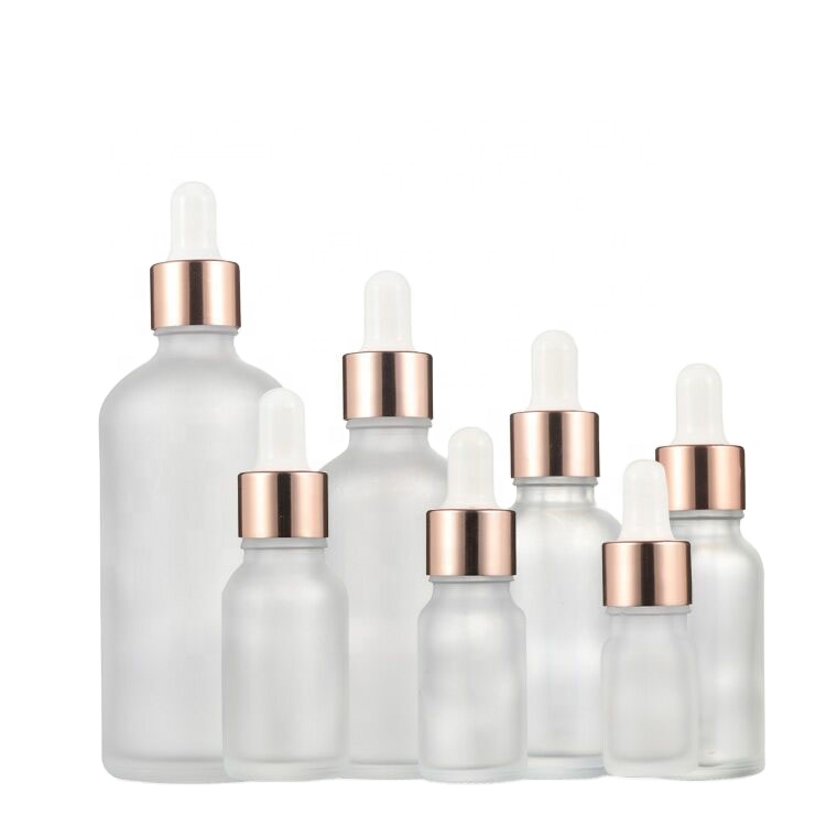 Wholesale 10ml 15ml 20ml 30ml 50ml 100ml White Frosted  Essential oil Serum Glass Bottle with Rose Gold Dropper Cap