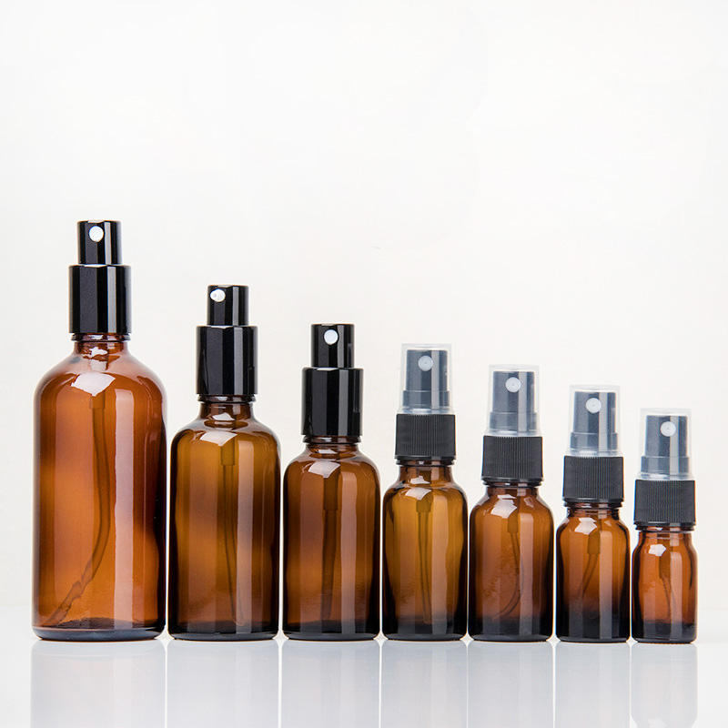 Wholesale 10ml 20ml 30ml 50ml 100ml amber glass spray bottle empty essential oil glass bottle with plastic atomizer pump
