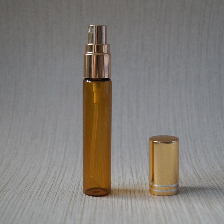 Wholesale 10ml clear amber mini tester perfume glass tube bottle with mist spray caps
