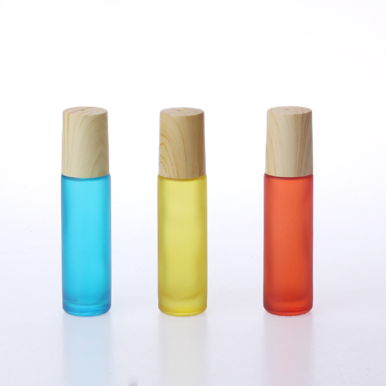 Wholesale 10ml frosted glass roll on colorful wood grain cap perfume bottle