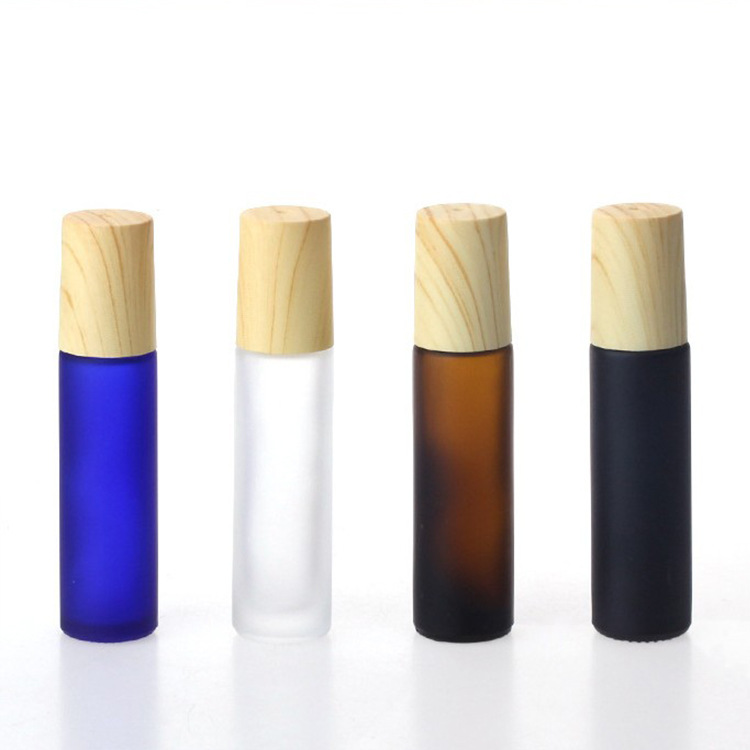 Wholesale 10ml frosted glass roll on colorful wood grain cap perfume bottle