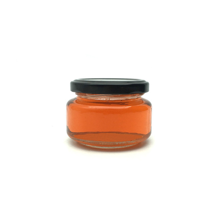 Wholesale 120ml flat glass packaging jar for honey jam peanut butter jar with cap