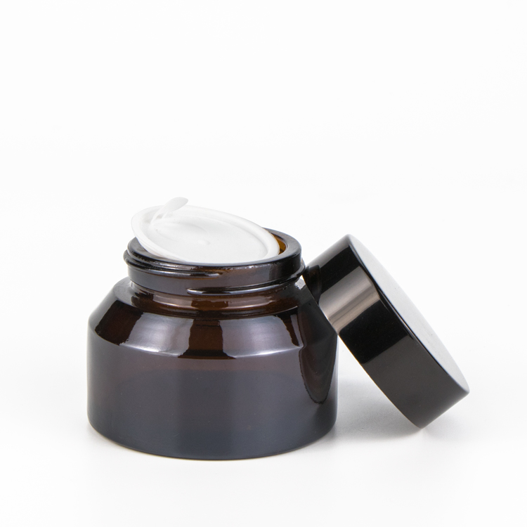 Wholesale 15 30 50 125 200 g empty cylinder shape makeup cream matte black glass cream jar for cosmetic cream with screw top cap