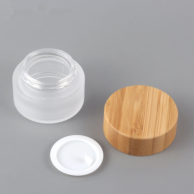 Wholesale 15ml 30ml 50ml bamboo packing container frosted glass Cream Container Cosmetic Jar with bamboo cap