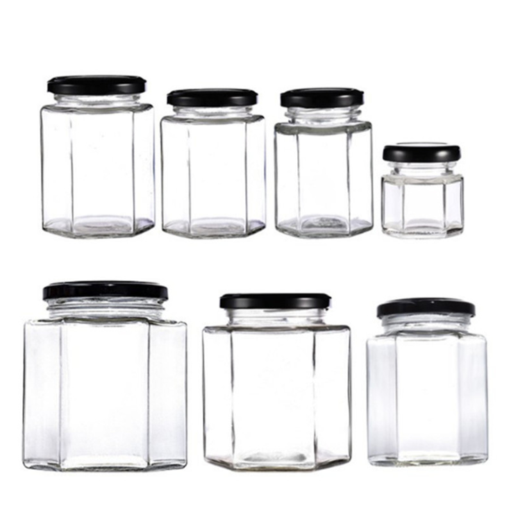 Wholesale 16 oz embossed luxury hexagon honey glass jar empty glass jars for canning with lid