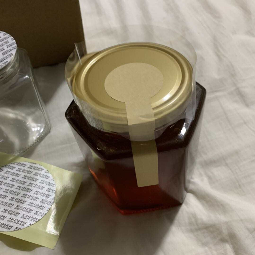 Wholesale 180ml 380ml 730ml hexagonal food honey jar with hard foam cork