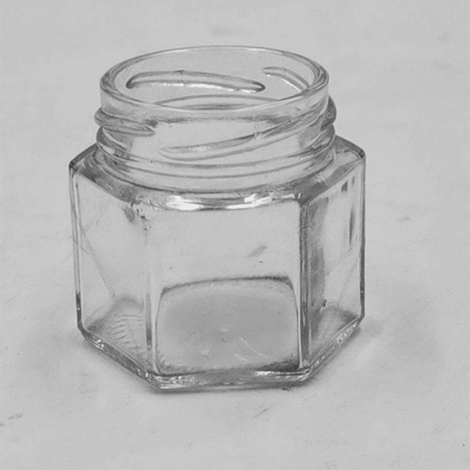 Wholesale 180ml 380ml 730ml hexagonal food honey jar with hard foam cork