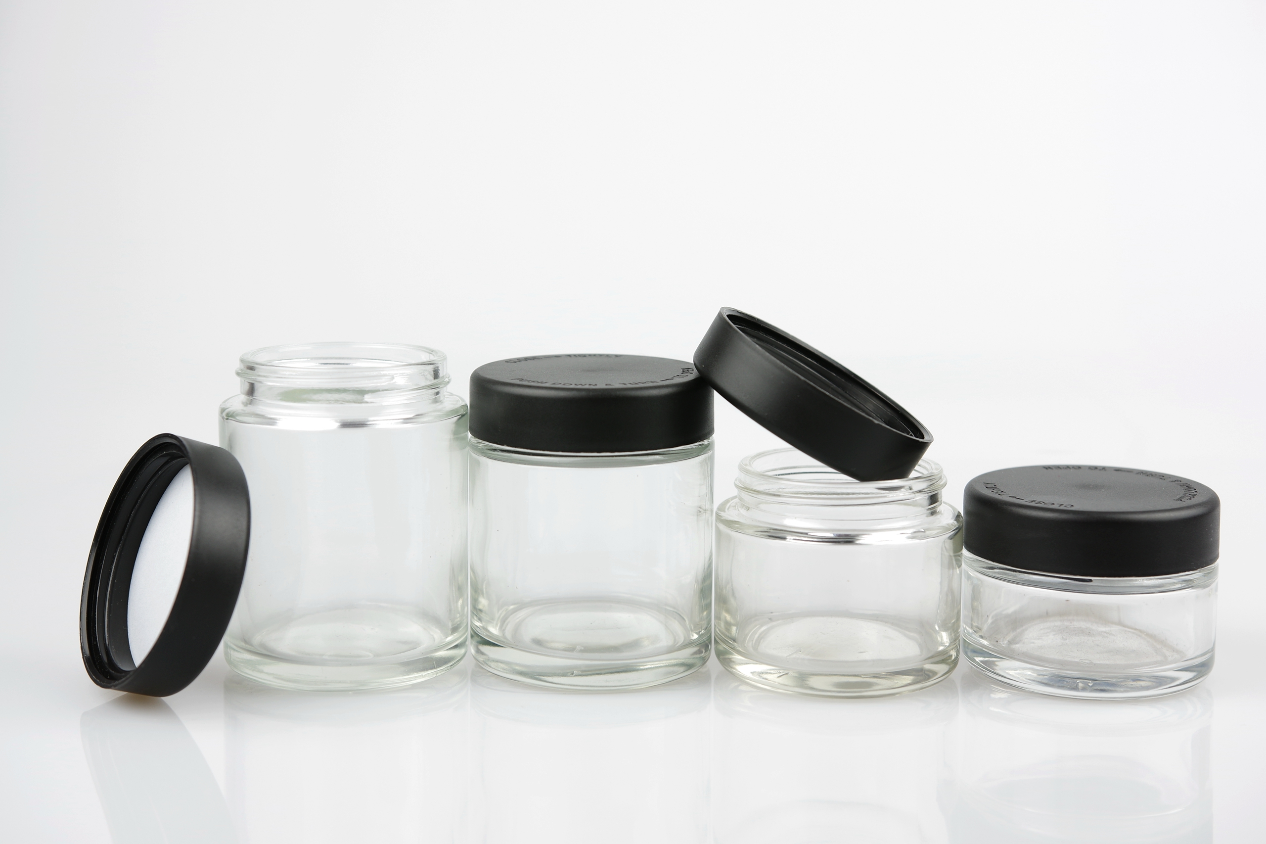 Wholesale 1oz 2oz 3oz 4oz clear childproof cosmetic jars for cream