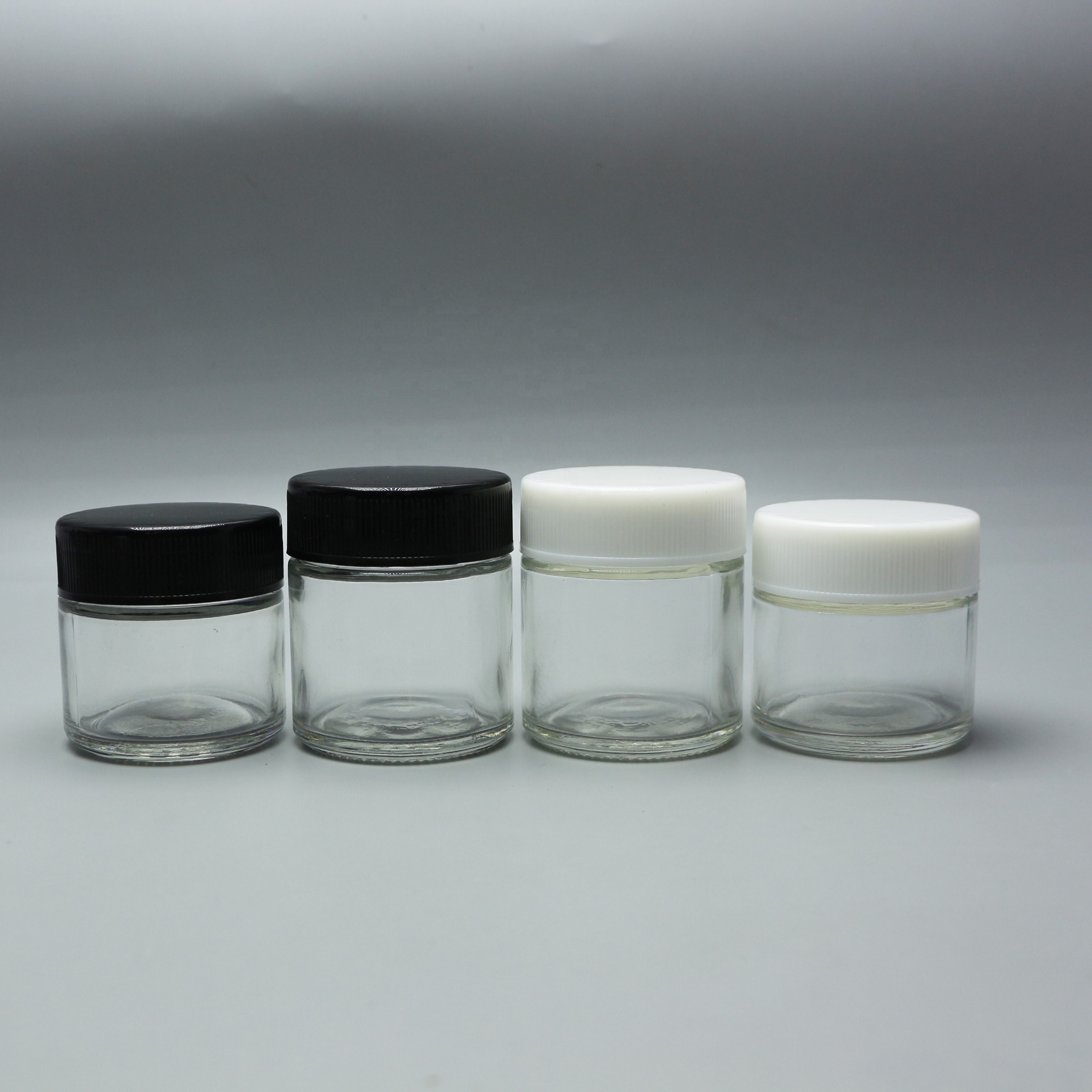 Wholesale 2 oz 4 oz 60ml 120ml straight sided black child resistant proof cosmetics glass packaging jars with black lid CGJ-34S