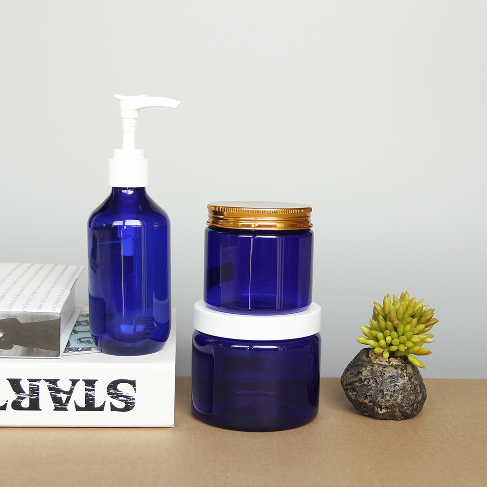 Wholesale 2 oz Blue Round Plastic Cosmetic Jar with White Screw Lids for Makeup Cream eye face cream