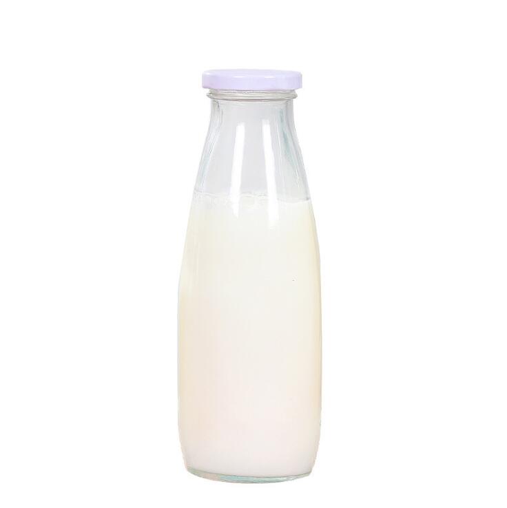 Wholesale 200 ML 250 ML 500 ML 1000 ML clear round milk beverage juice glass bottle with metal lid