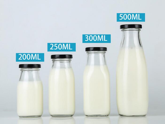 Wholesale 200 ML 250 ML 500 ML 1000 ML clear round milk beverage juice glass bottle with metal lid
