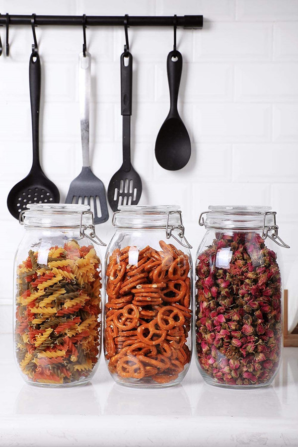 Wholesale 2000 ml clear round body air tight mental clip glass jar for storage