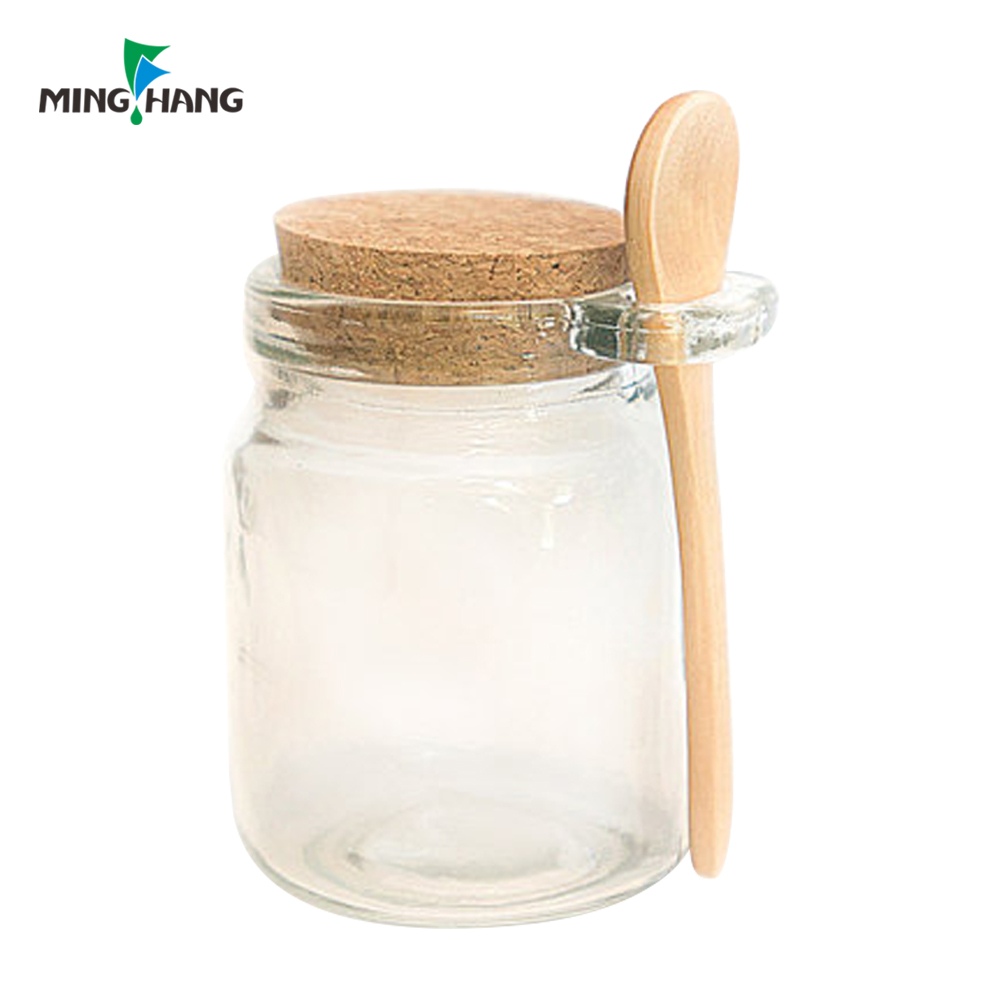 Wholesale 200ml 200g Round Empty Clear Food Storage Container Honey Glass Jar with Wooden Spoon