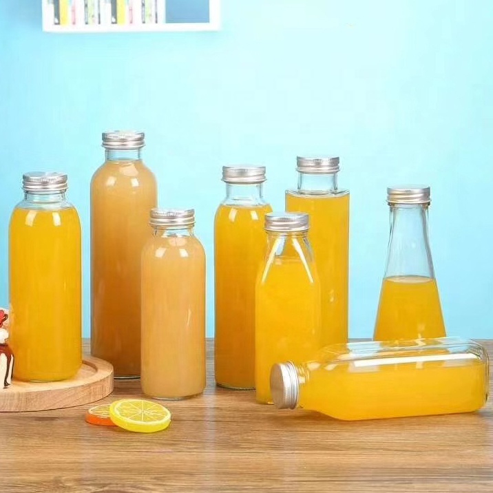 Wholesale 200ml 250ml 300ml 330ml 750ml Empty Clear Glass Juice Milk Bottles With Cap