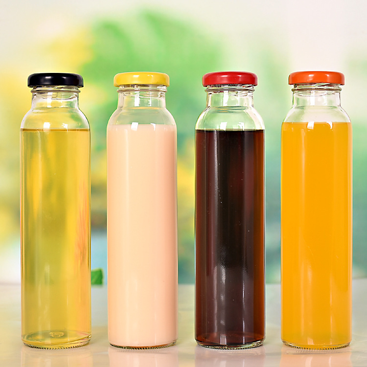 Wholesale 200ml 250ml 300ml beverage bottle juice glass bottle with lid