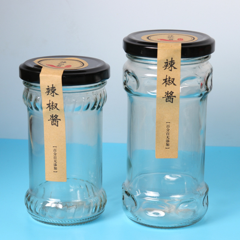 Wholesale 200ml glass jar for pickles food industry empty clear storage jars glass for beef paste ketchup with black metal lids