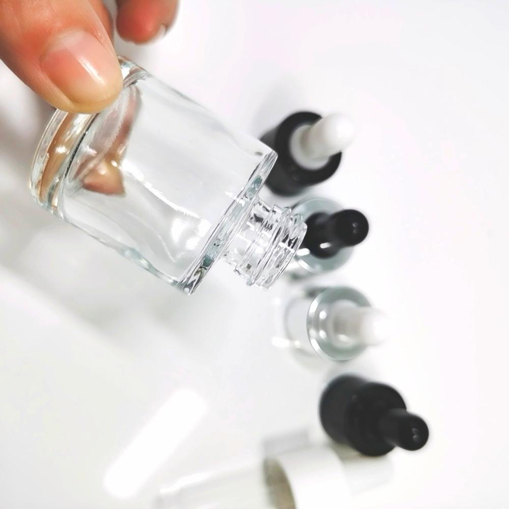 Wholesale 20ml 30ml 40ml 50ml clear round glass dropper bottle with white rubber dropper essence oil bottles with good price