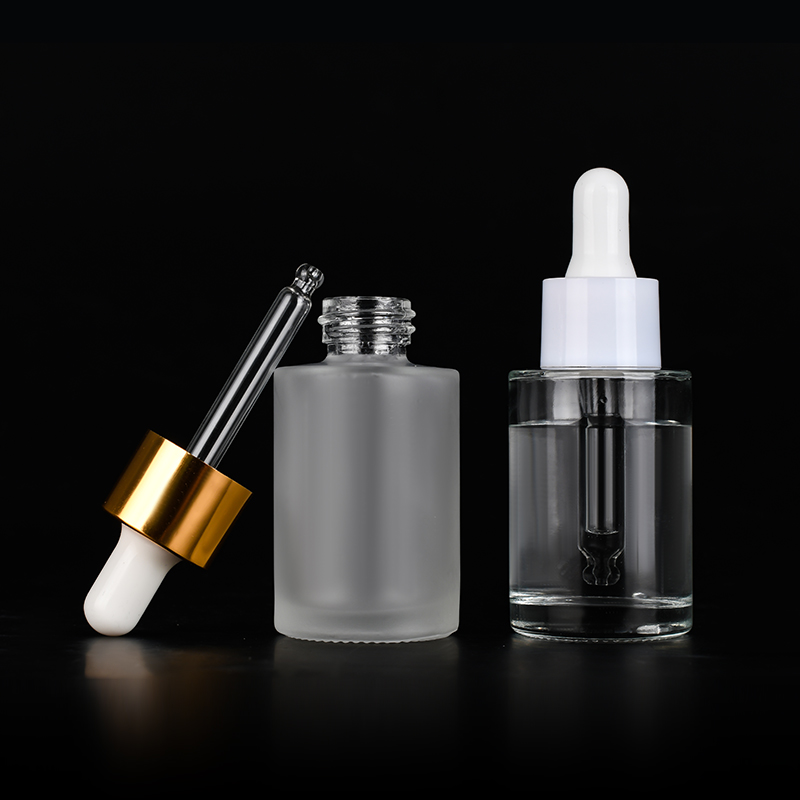 Wholesale 20ml 30ml 50ml 100ml Clear amber frosted flat shoulder glass dropper bottle for essential oil