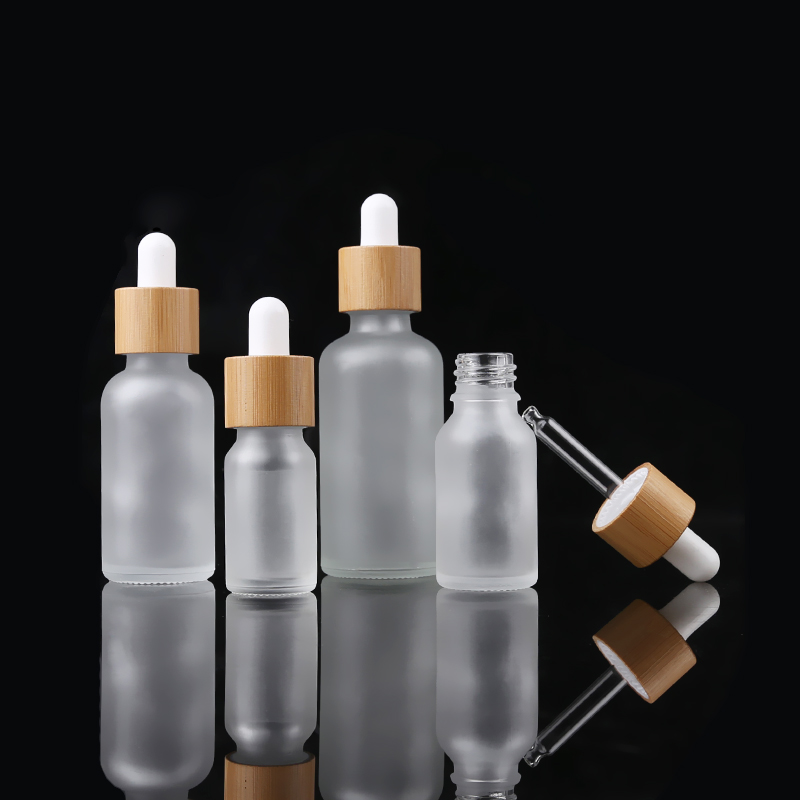 Wholesale 20ml Empty Essential Oil Bottle Dropper Frosted Glasss Bottle with Bamboo Lid