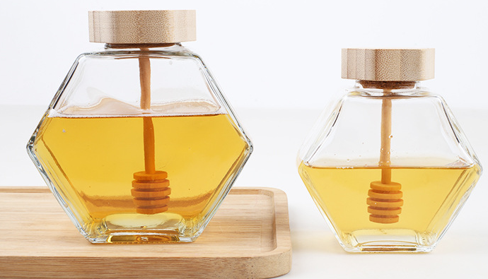 Wholesale 220ml 380ml 250g 500g bamboo cover empty hexagon natural royal honey jar container glass honey jar with dipper