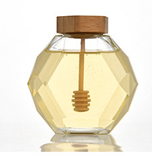 Wholesale 220ml 380ml 250g 500g bamboo cover empty hexagon natural royal honey jar container glass honey jar with dipper