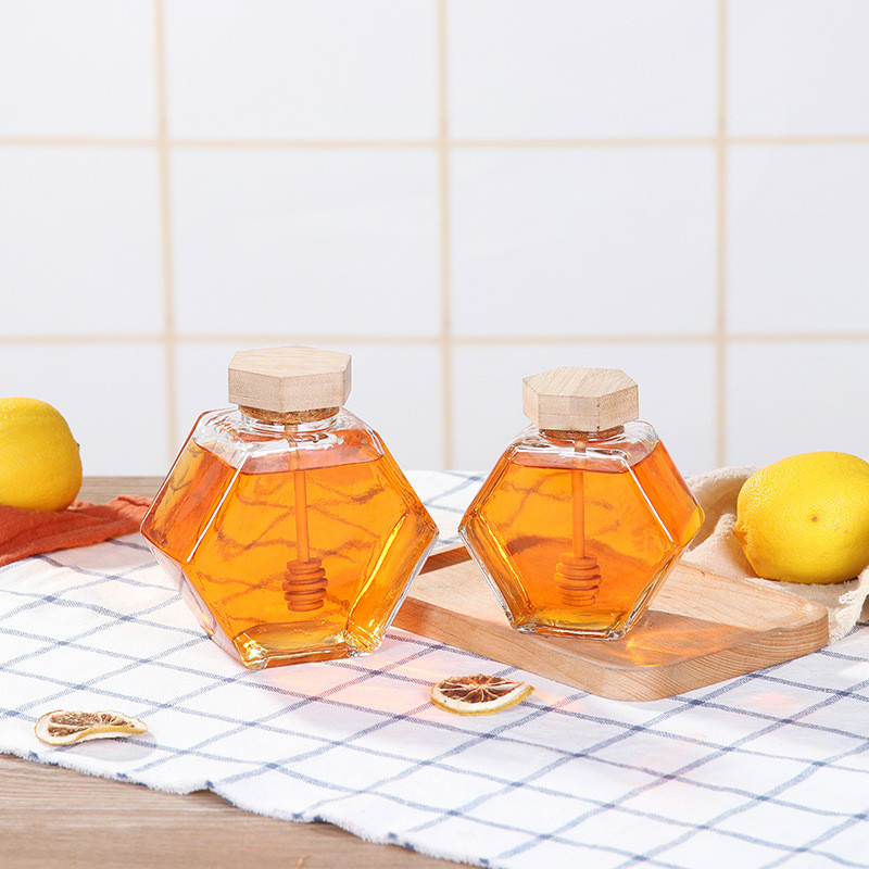 Wholesale 220ml 380ml 250g 500g bamboo cover empty hexagon natural royal honey jar container glass honey jar with dipper