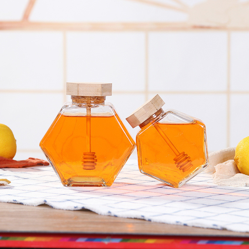 Wholesale 220ml 380ml 250g 500g bamboo cover empty hexagon natural royal honey jar container glass honey jar with dipper