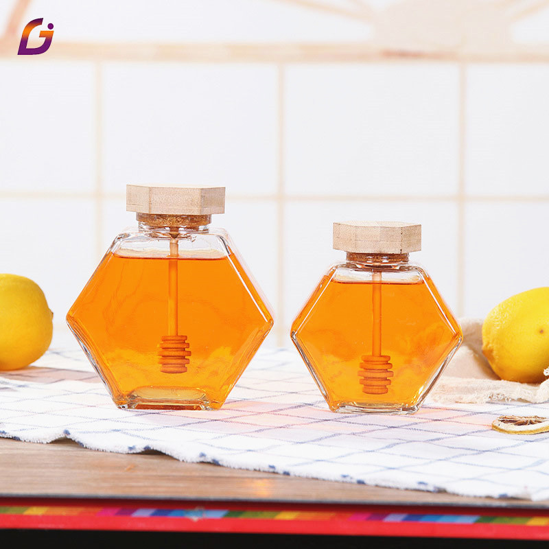 Wholesale 220ml 380ml 250g 500g bamboo cover empty hexagon natural royal honey jar container glass honey jar with dipper
