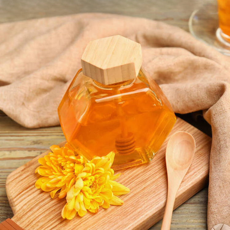 Wholesale 220ml 380ml 250g 500g bamboo cover empty hexagon natural royal honey jar container glass honey jar with dipper