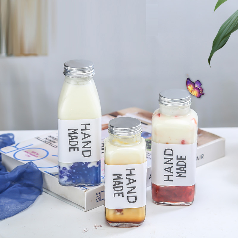 Wholesale 250ml 350ml 500ml glass milk bottle with lid