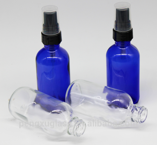 Wholesale 2oz 60ml spray cosmetic bottle cobalt blue boston round glass essential oil bottle with pump sprayer