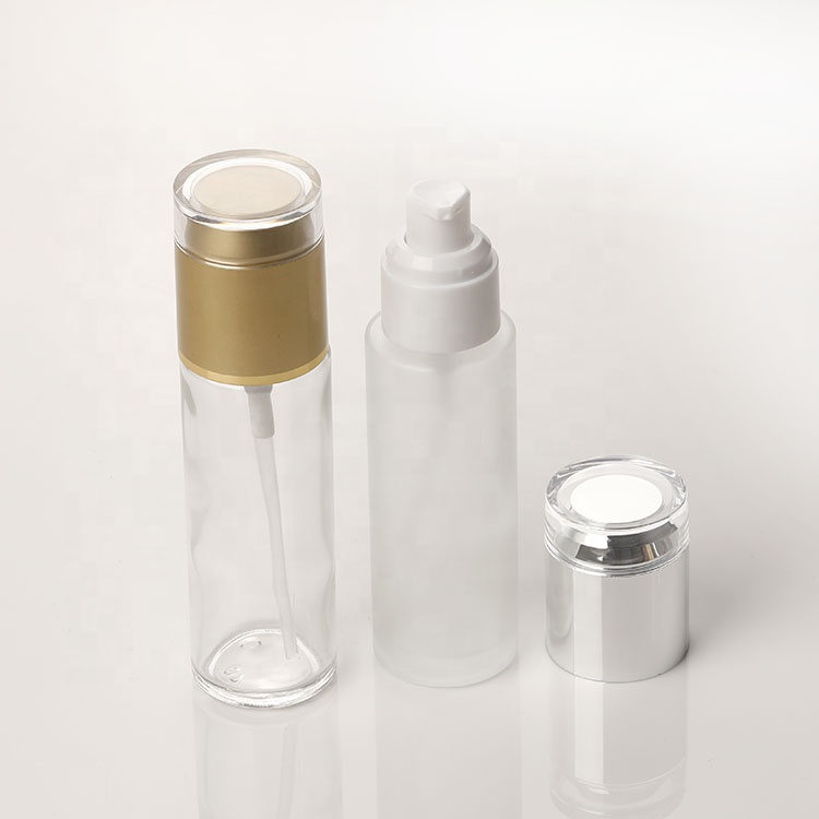 Wholesale 30 60ml Frosted Glass Bottle Diffuser Empty Skin Care Serum Lotion Pump Bottle with Silver Treatment Pump